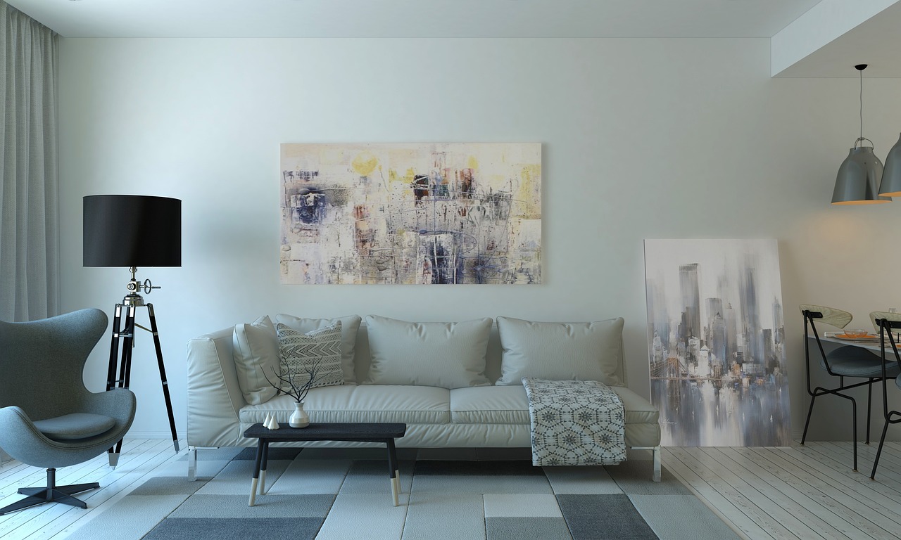 Een woonkamer met greige muren en kleurrijke accessoires. Een woonkamer met greige muren en kleurrijke accessoires.